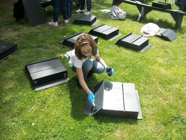 Bat houses getting the finishing touches.