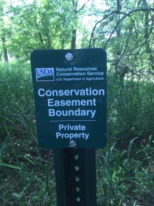 NRCS easement boundary sign.