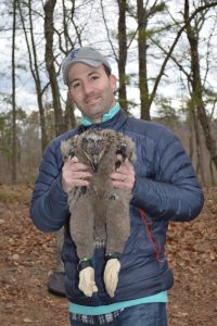 Fiorentino holding an eaglet